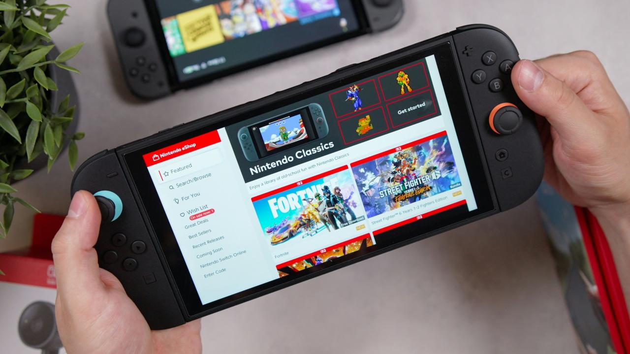Someone is holding a handheld gaming console.